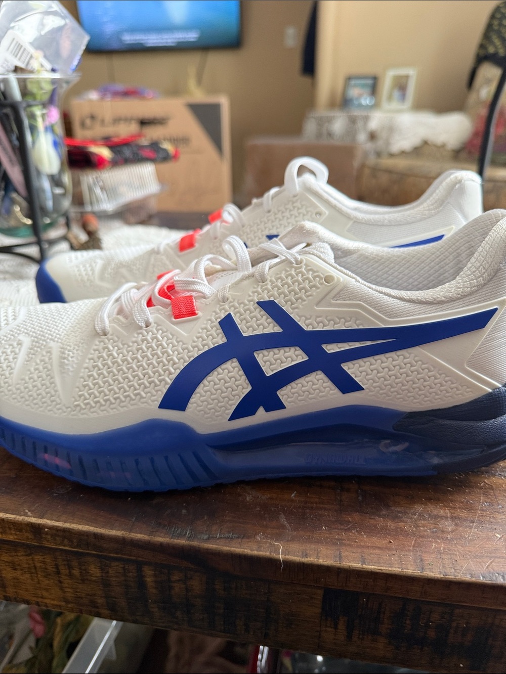 Asics Gel resolution White Athletic Shoes with Blue Accents and Orange Lace Tabs